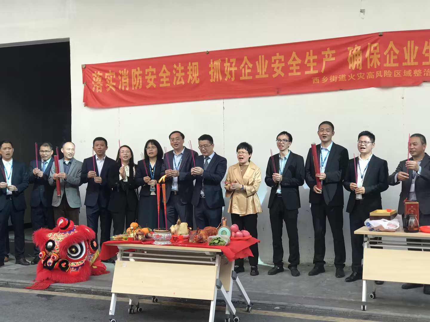 a group of leaders standing infront of a building